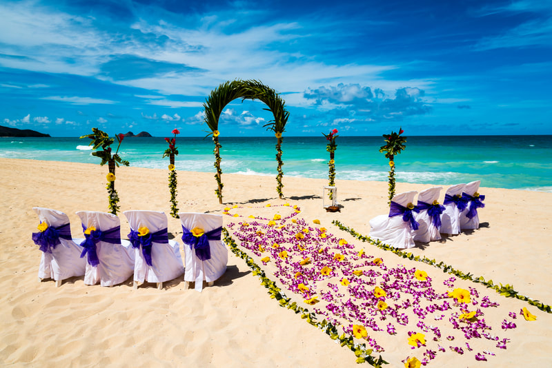 Small tropical beach wedding ceremony